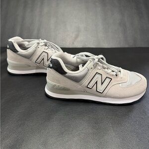 Woman’s New Balance sneakers.  Size 7.5.  Worn a few times.